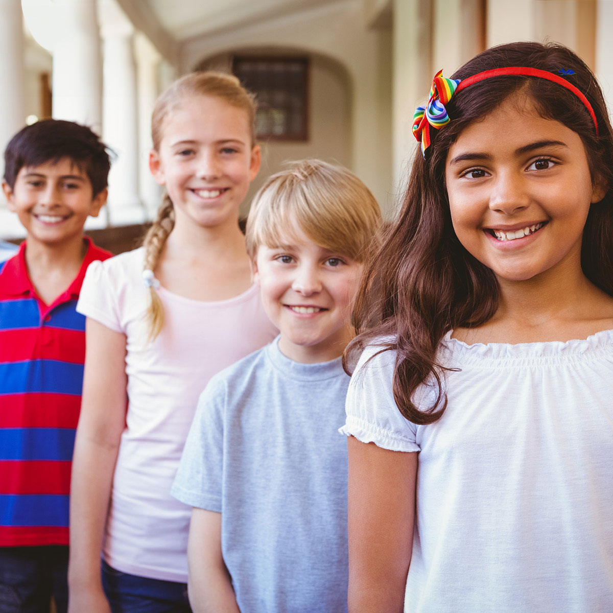 Young children from various countries represent a middle school for ages 6 to 10.